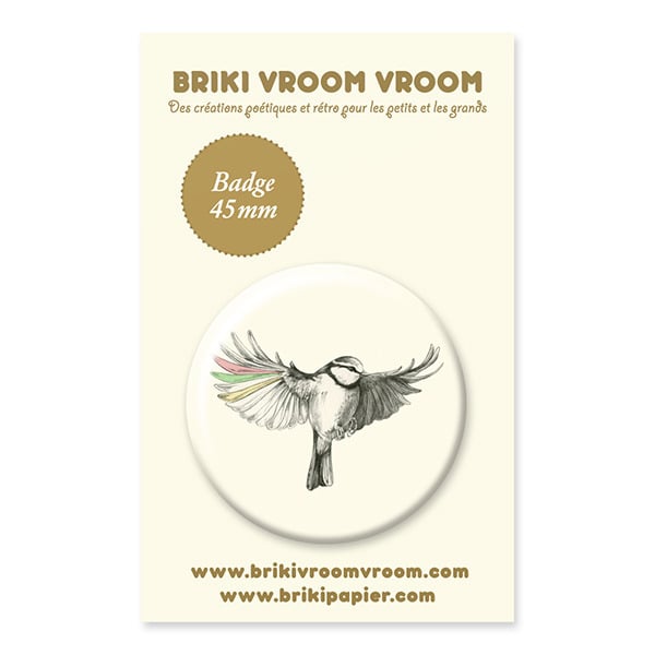 Badge oiseau ailes colorées