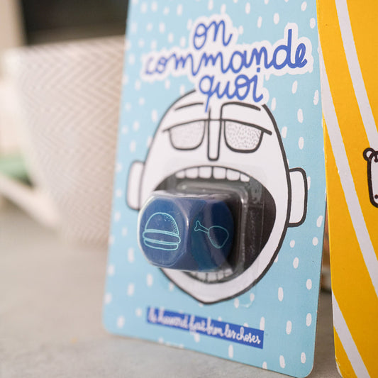 Un dé "On commande quoi ?"